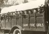 Campers ride in a wagon